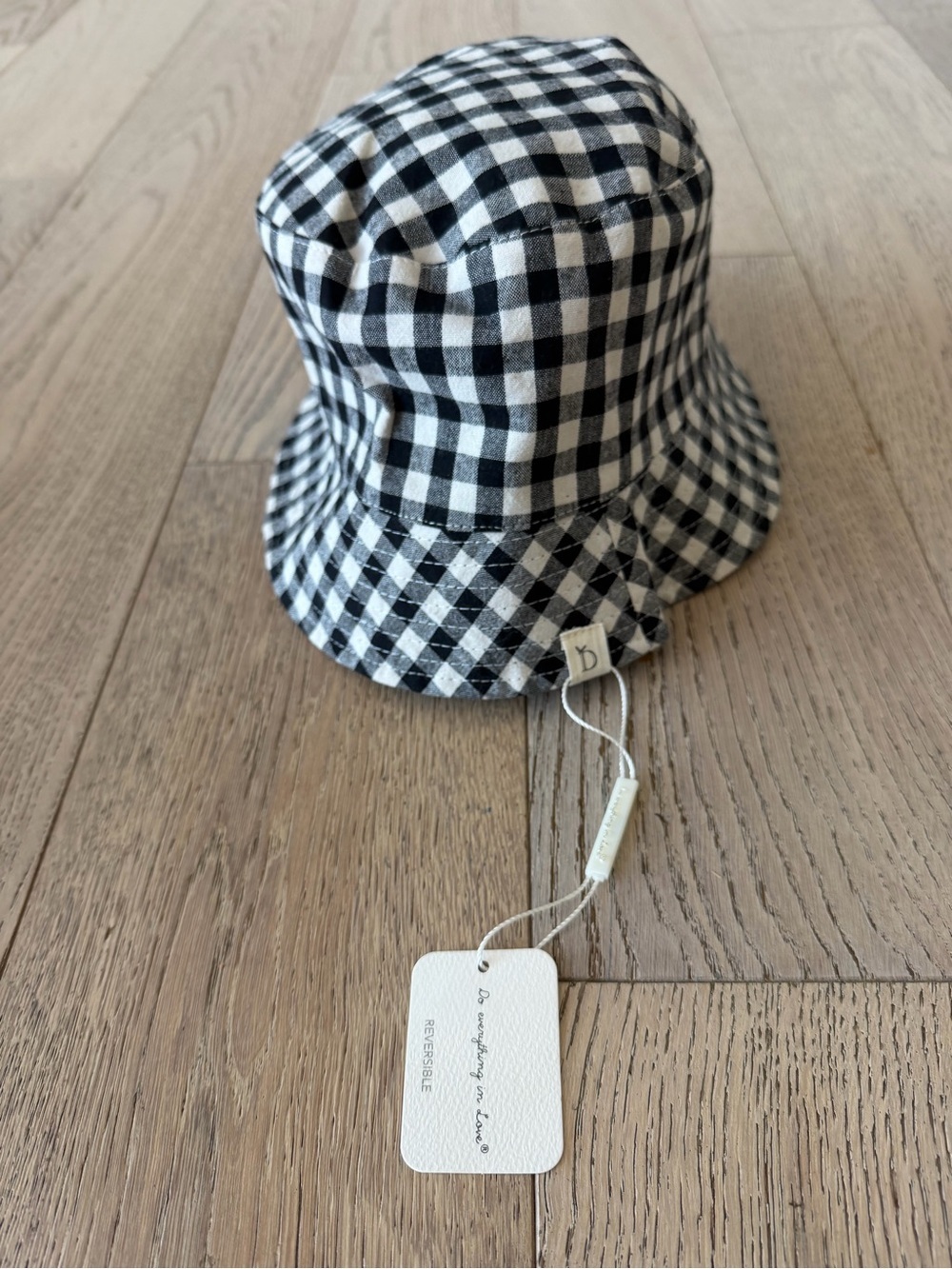 Do Everything in Love Reversible Bucket Hat Black Gingham